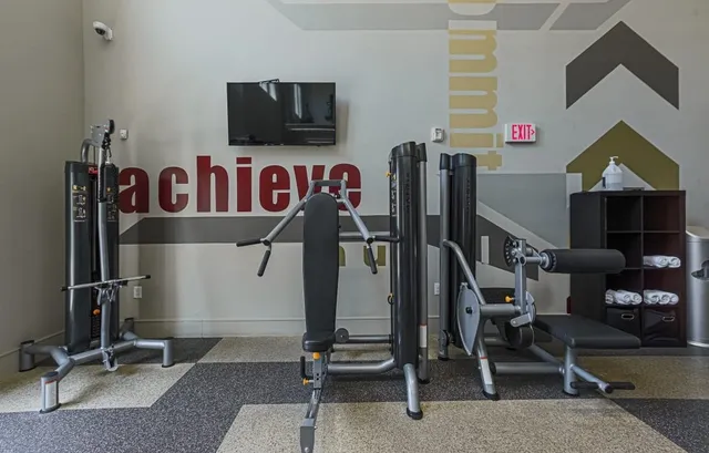a view of a room with gym equipment