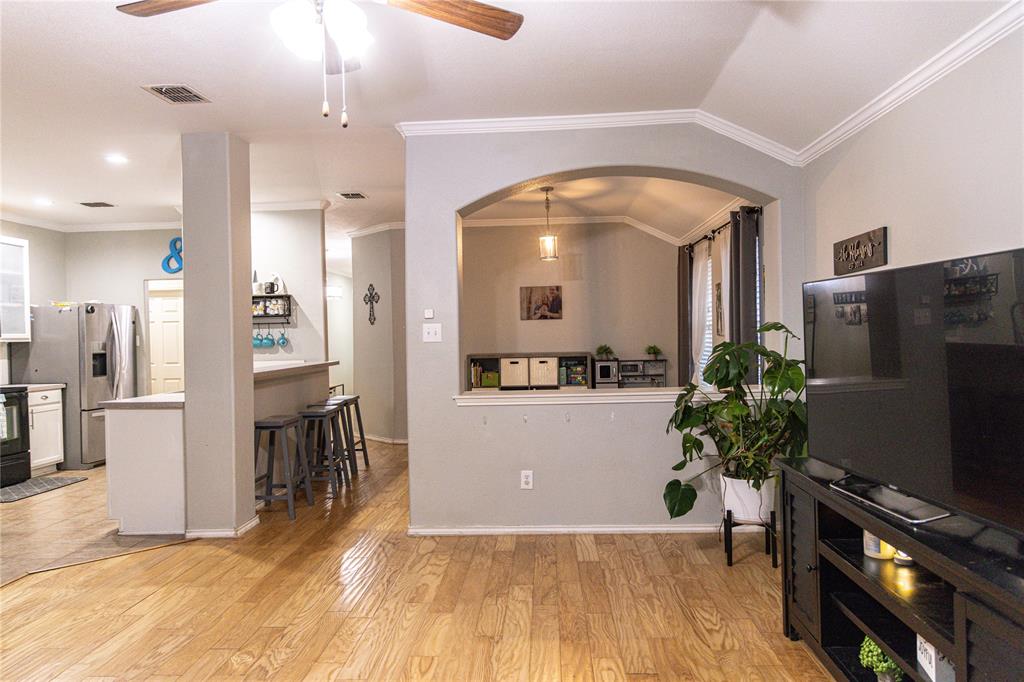 104 South Forest Grove Princeton, TX 75407 - Photo 13 of 36 a view of a living room and a kitchen