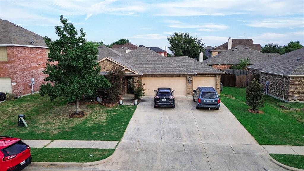 104 South Forest Grove Princeton, TX 75407 - Photo 2 of 36 a view of a house with a patio