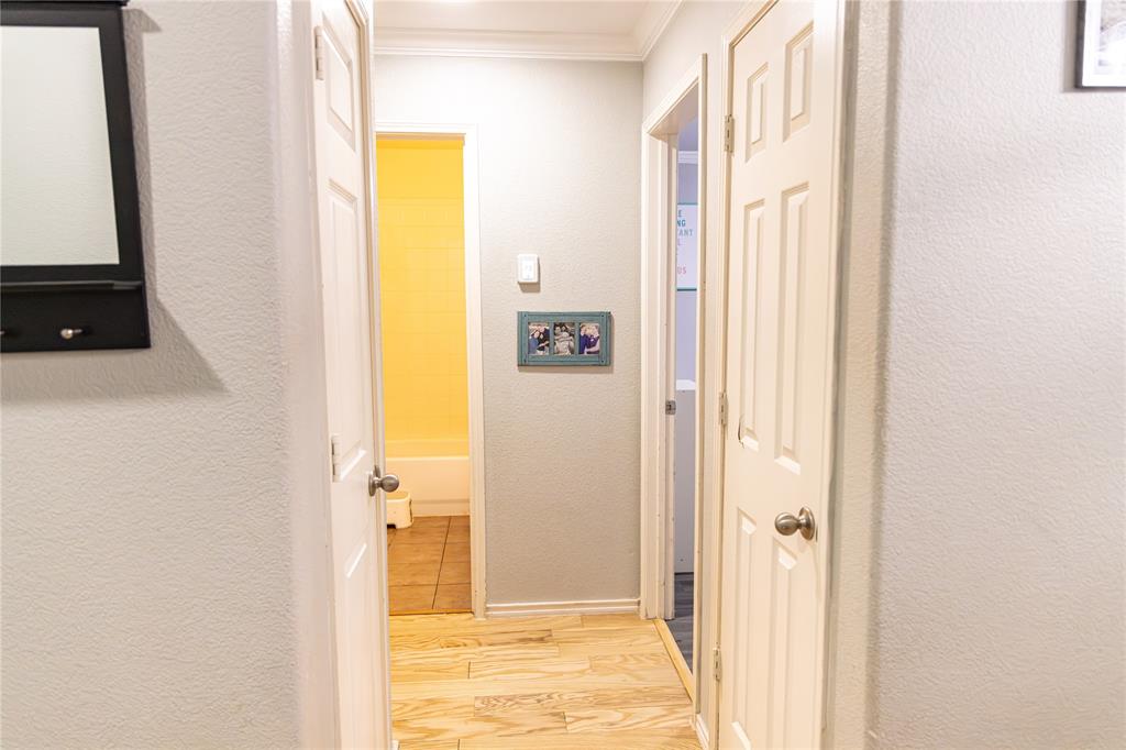 104 South Forest Grove Princeton, TX 75407 - Photo 36 of 36 a view of a bathroom from a hallway