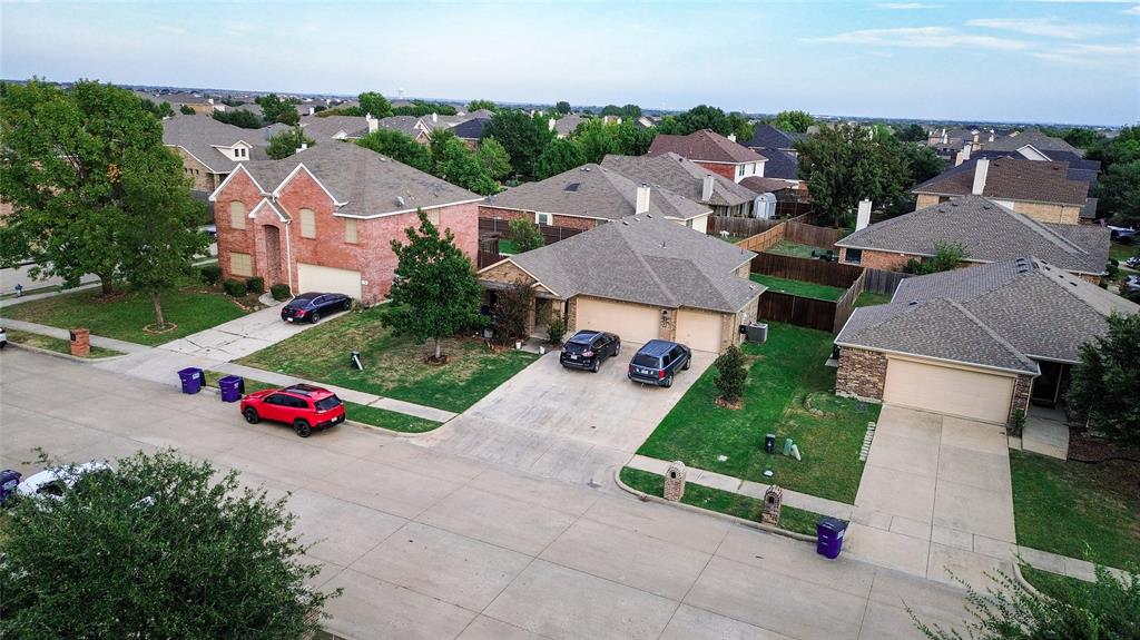 104 South Forest Grove Princeton, TX 75407 - Photo 6 of 36 an aerial view of residential houses with outdoor space