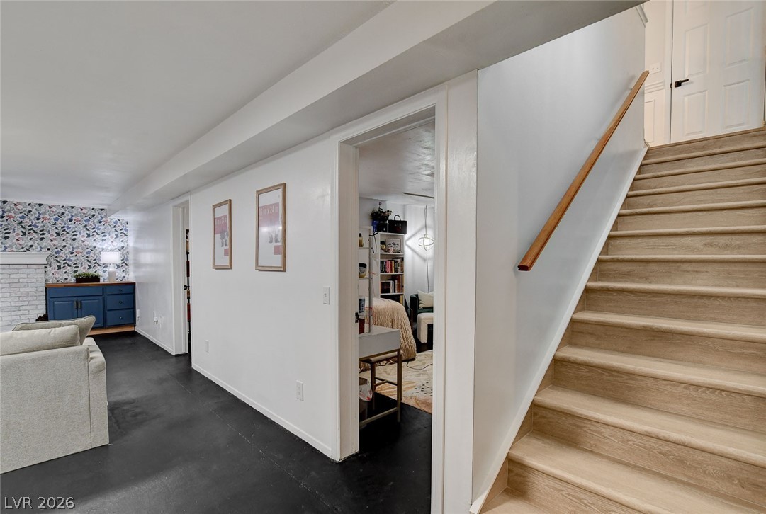 3765 Berkeley Street Logandale, NV 89021 - Photo 48 of 87 This interior showcases a bright, open living space with cool flooring and architectural details.