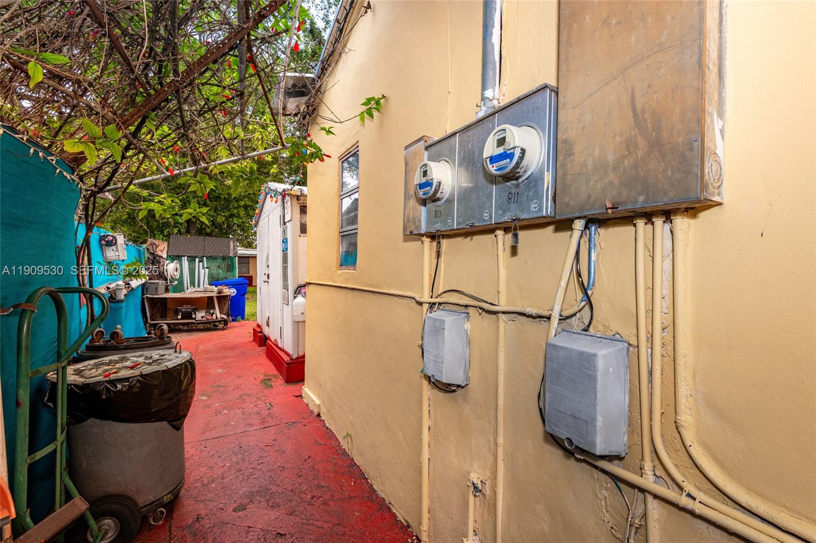 811 Northwest 24th Court Miami, FL 33125 - Photo 14 of 18 a street view with couple of cars parked on road