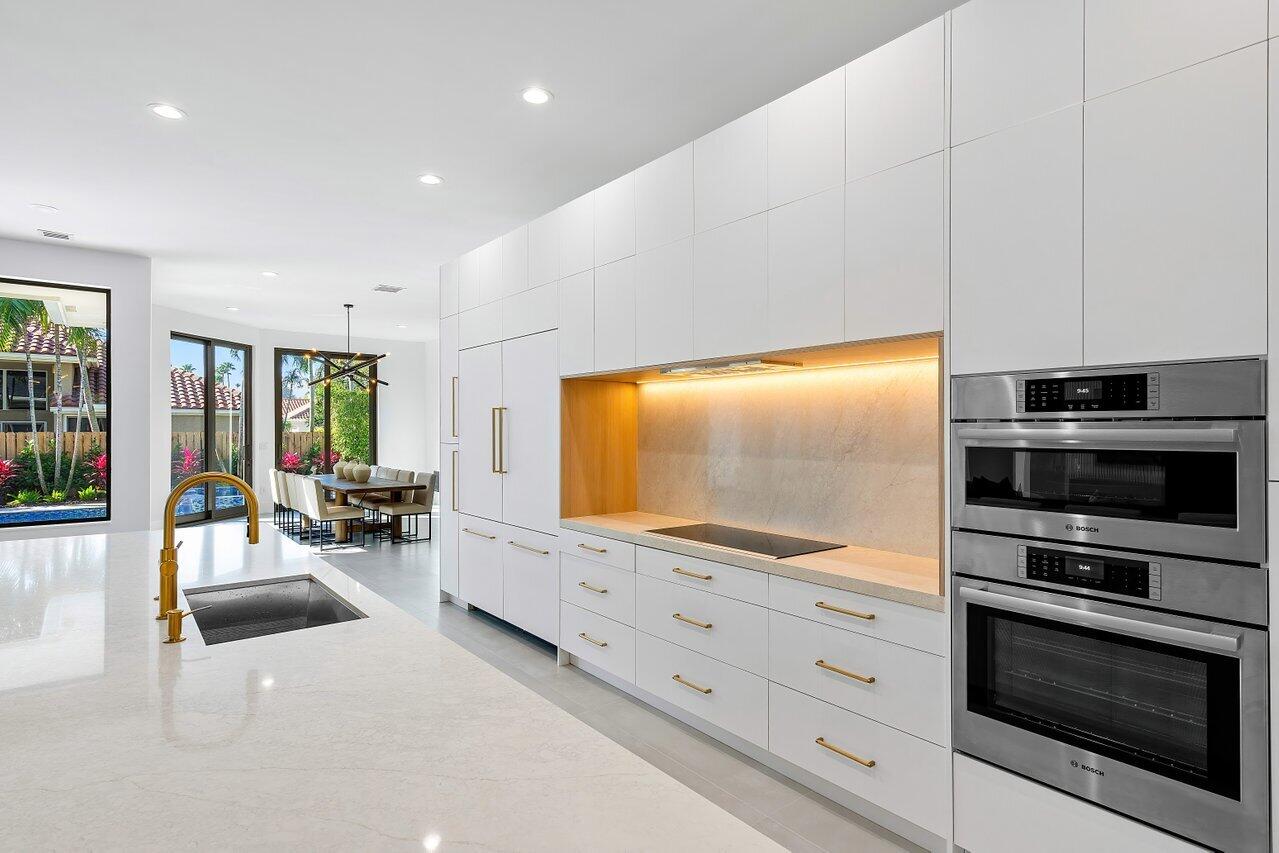 636 Eddy Street Boca Raton, FL 33487 - Photo 17 of 44 a living room with furniture and flat screen tv