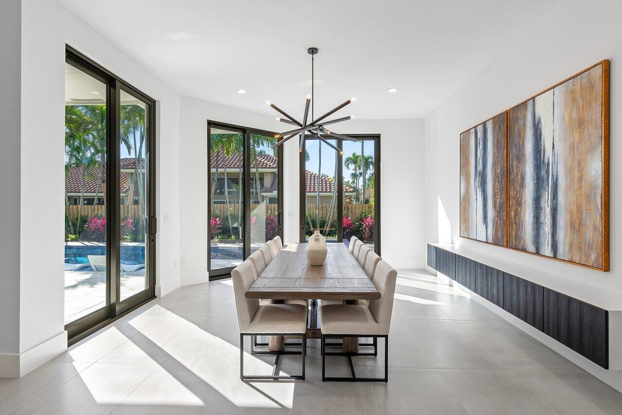 636 Eddy Street Boca Raton, FL 33487 - Photo 18 of 44 a dining room with furniture window and outside view