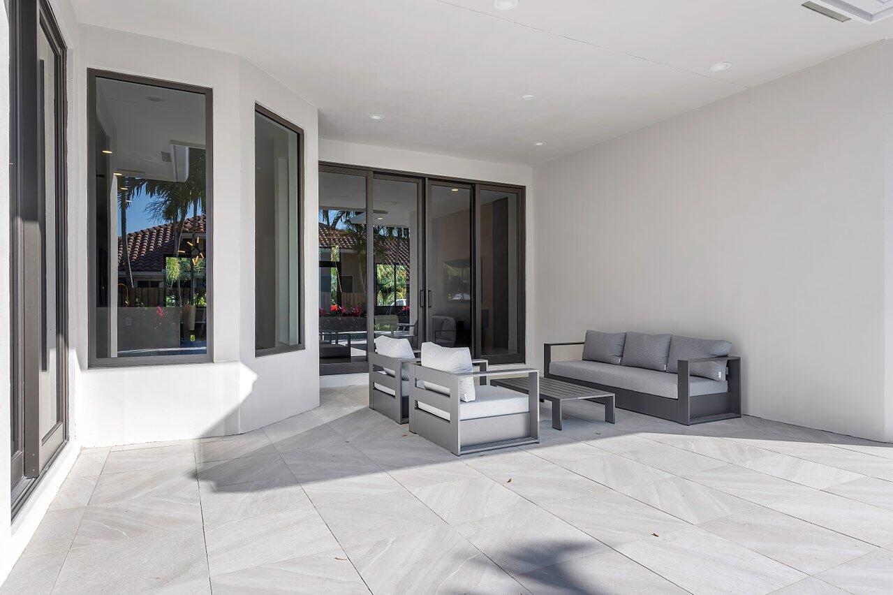 636 Eddy Street Boca Raton, FL 33487 - Photo 20 of 44 a living room with furniture and large window