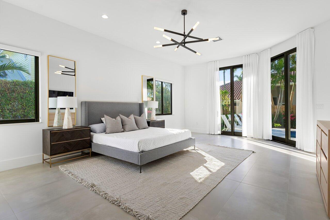 636 Eddy Street Boca Raton, FL 33487 - Photo 26 of 44 a living room with furniture and a large window