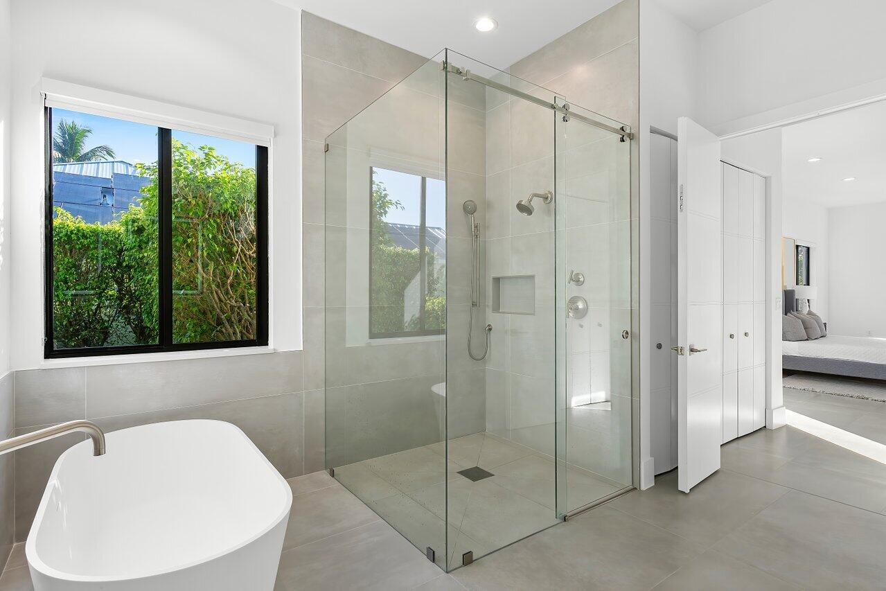 636 Eddy Street Boca Raton, FL 33487 - Photo 31 of 44 a bathroom with a shower and a sink