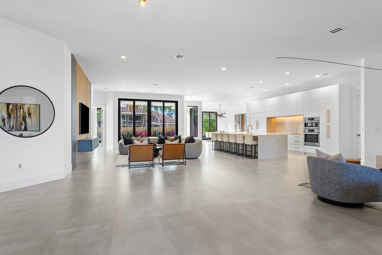 636 Eddy Street Boca Raton, FL 33487 - Photo 8 of 44 a living room with furniture and a large window