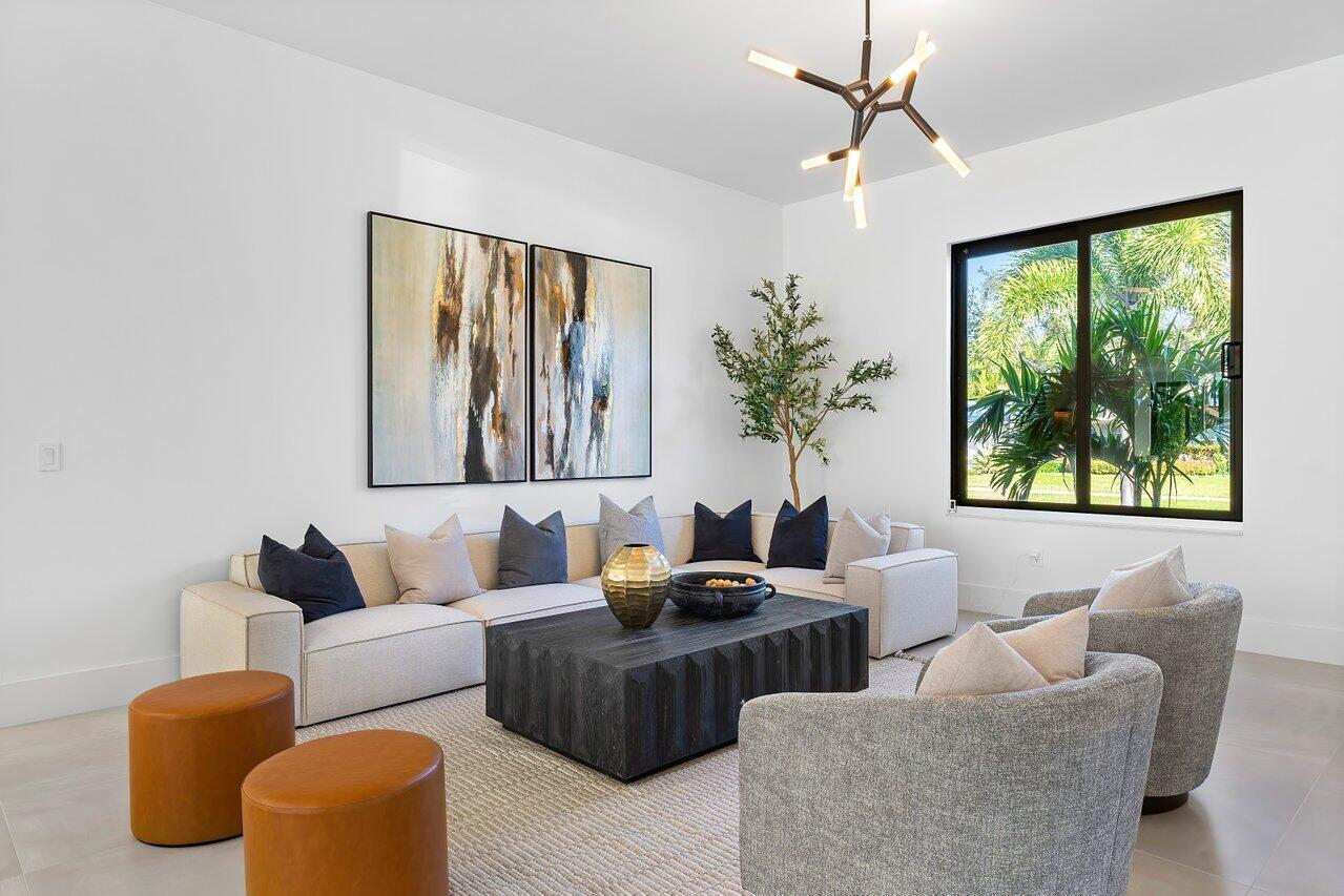 636 Eddy Street Boca Raton, FL 33487 - Photo 9 of 44 a living room with furniture and a large window