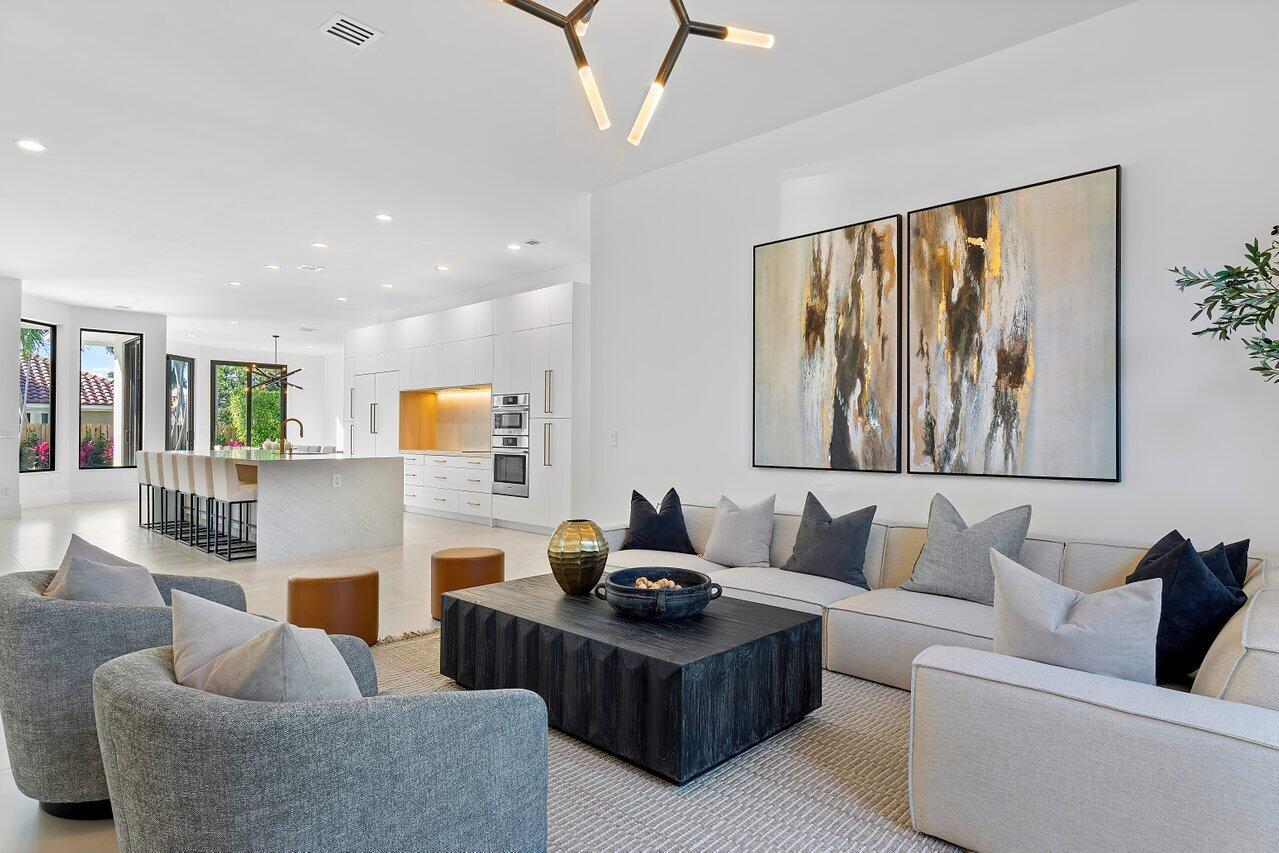 636 Eddy Street Boca Raton, FL 33487 - Photo 10 of 44 a living room with furniture and a large window