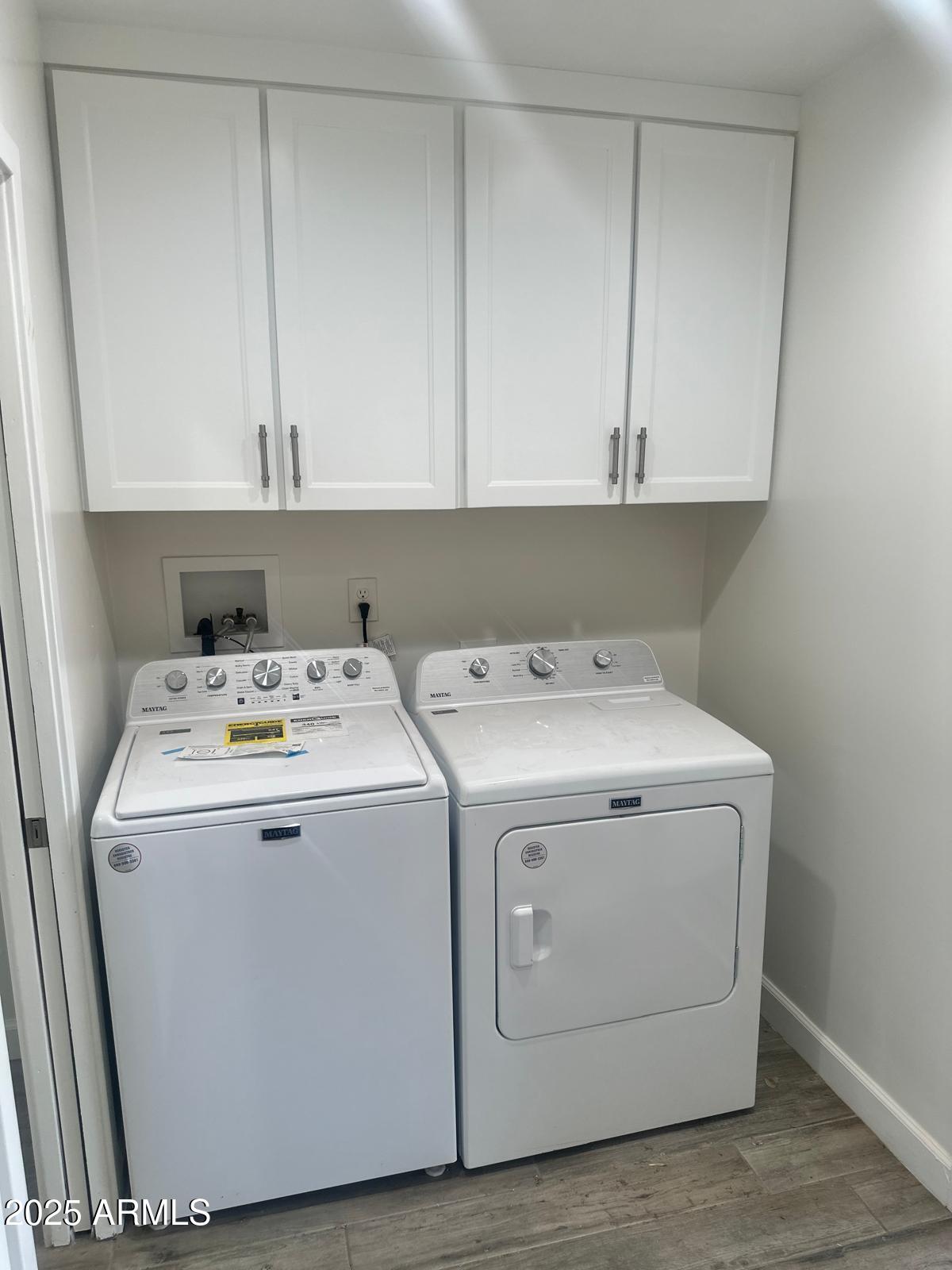 4311 West Sandra Circle Glendale, AZ 85308 - Photo 6 of 19 a utility room with dryer and washer