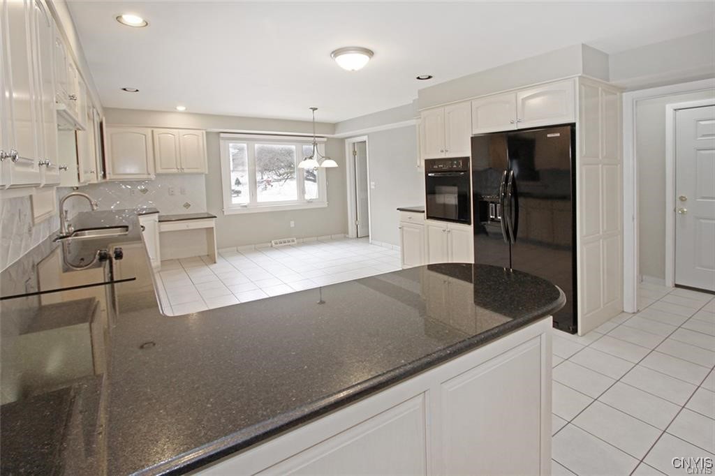 101 Britain Road Manlius, NY 13066 - Photo 11 of 31 Door on the right goes to the 2 car garage.