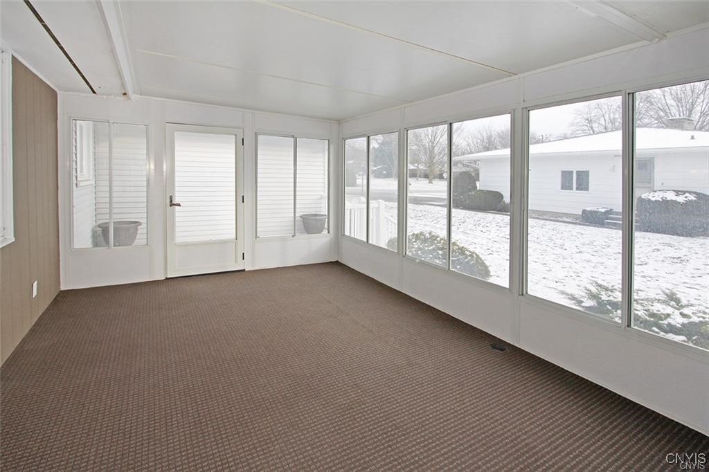 101 Britain Road Manlius, NY 13066 - Photo 16 of 31 Enclosed sunporch. The door straight ahead goes