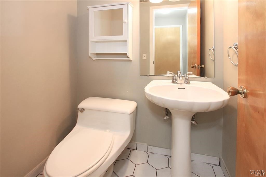 101 Britain Road Manlius, NY 13066 - Photo 17 of 31 Half bath off the kitchen/mudroom.