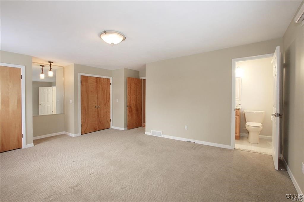 101 Britain Road Manlius, NY 13066 - Photo 21 of 31 Master bedroom showing entrance into master bath