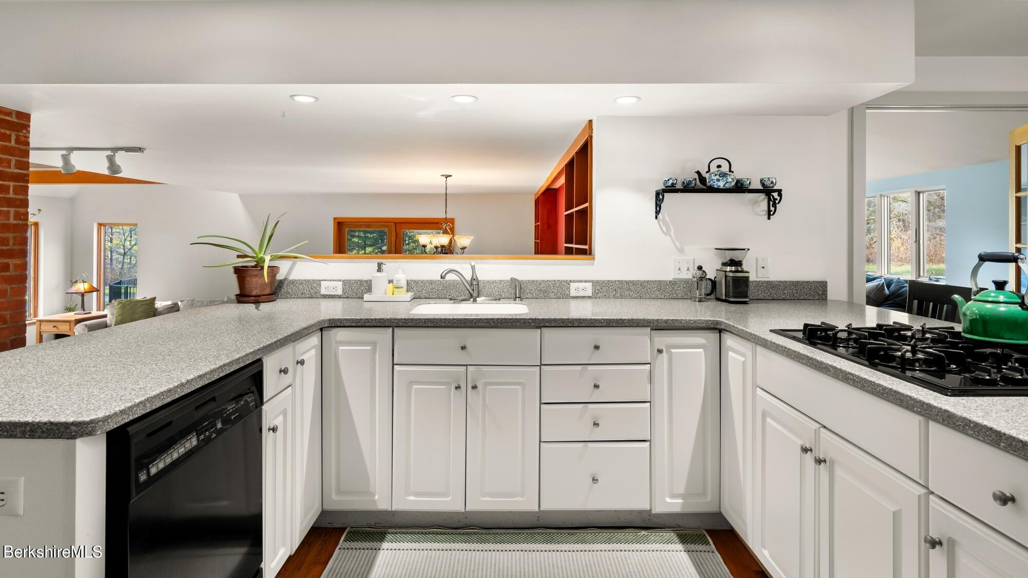 16 Interlaken Road Stockbridge, MA 01266 - Photo 14 of 42 a kitchen with sink cabinets and stove
