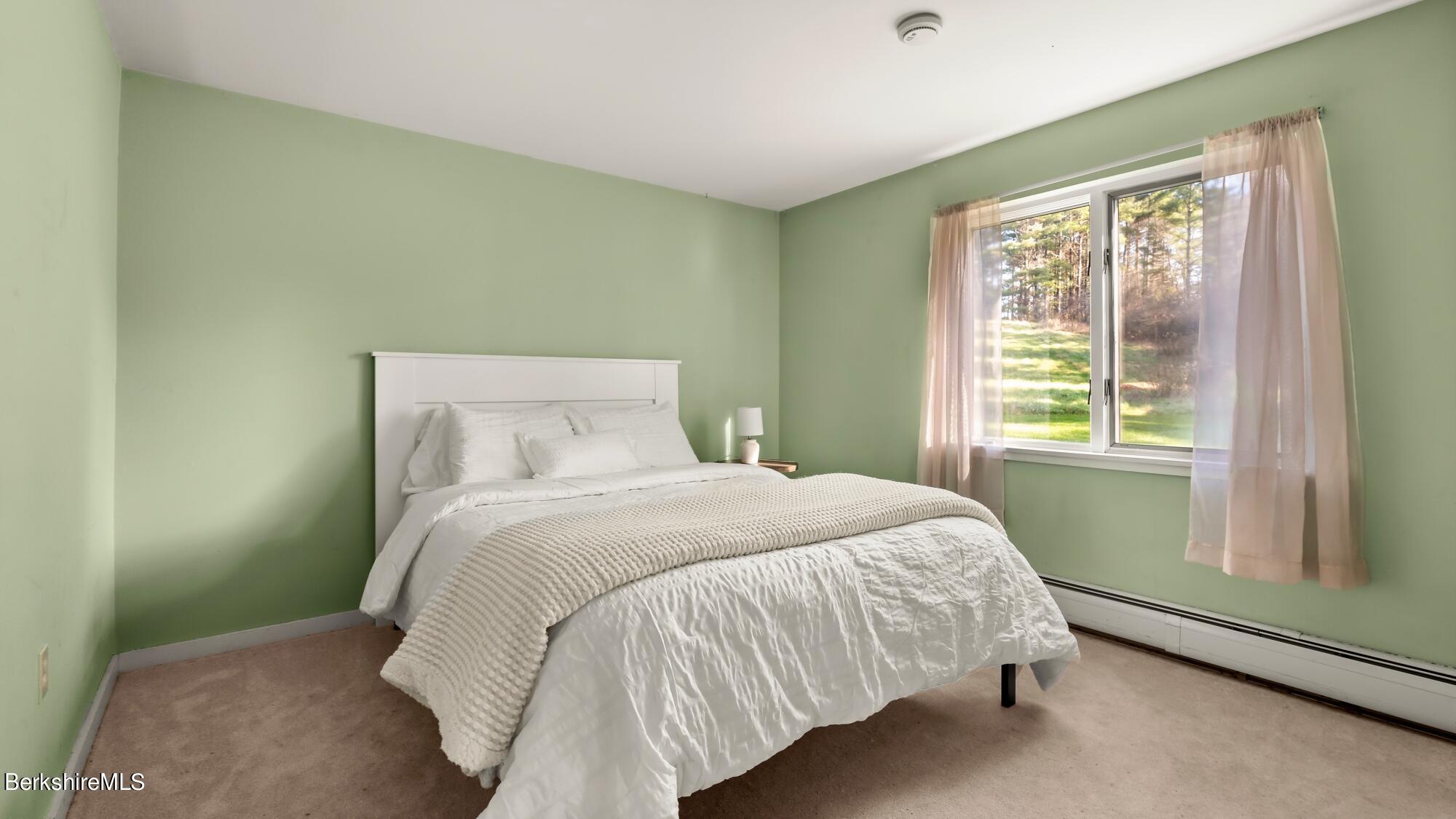 16 Interlaken Road Stockbridge, MA 01266 - Photo 23 of 42 a bedroom with a bed and window
