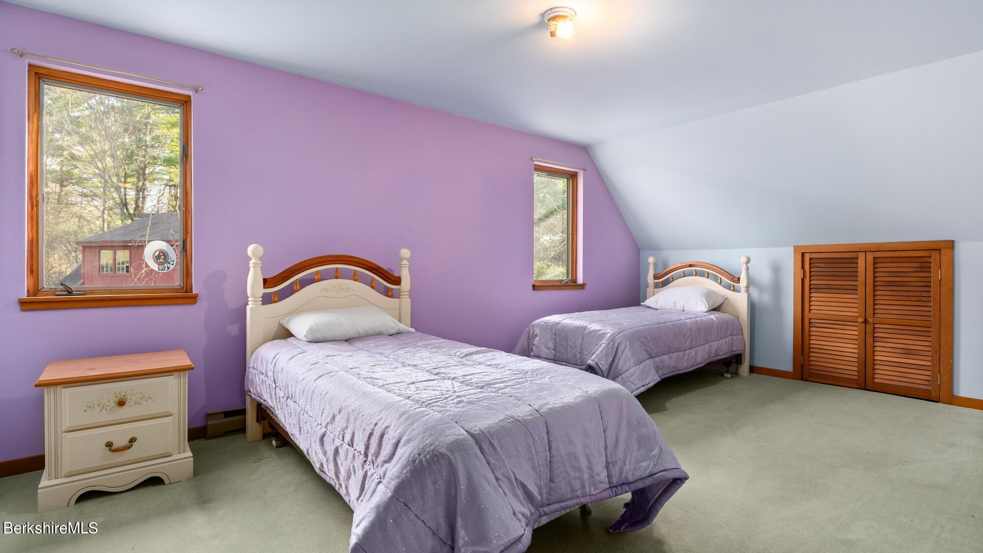 16 Interlaken Road Stockbridge, MA 01266 - Photo 29 of 42 a bedroom with a bed and a dresser