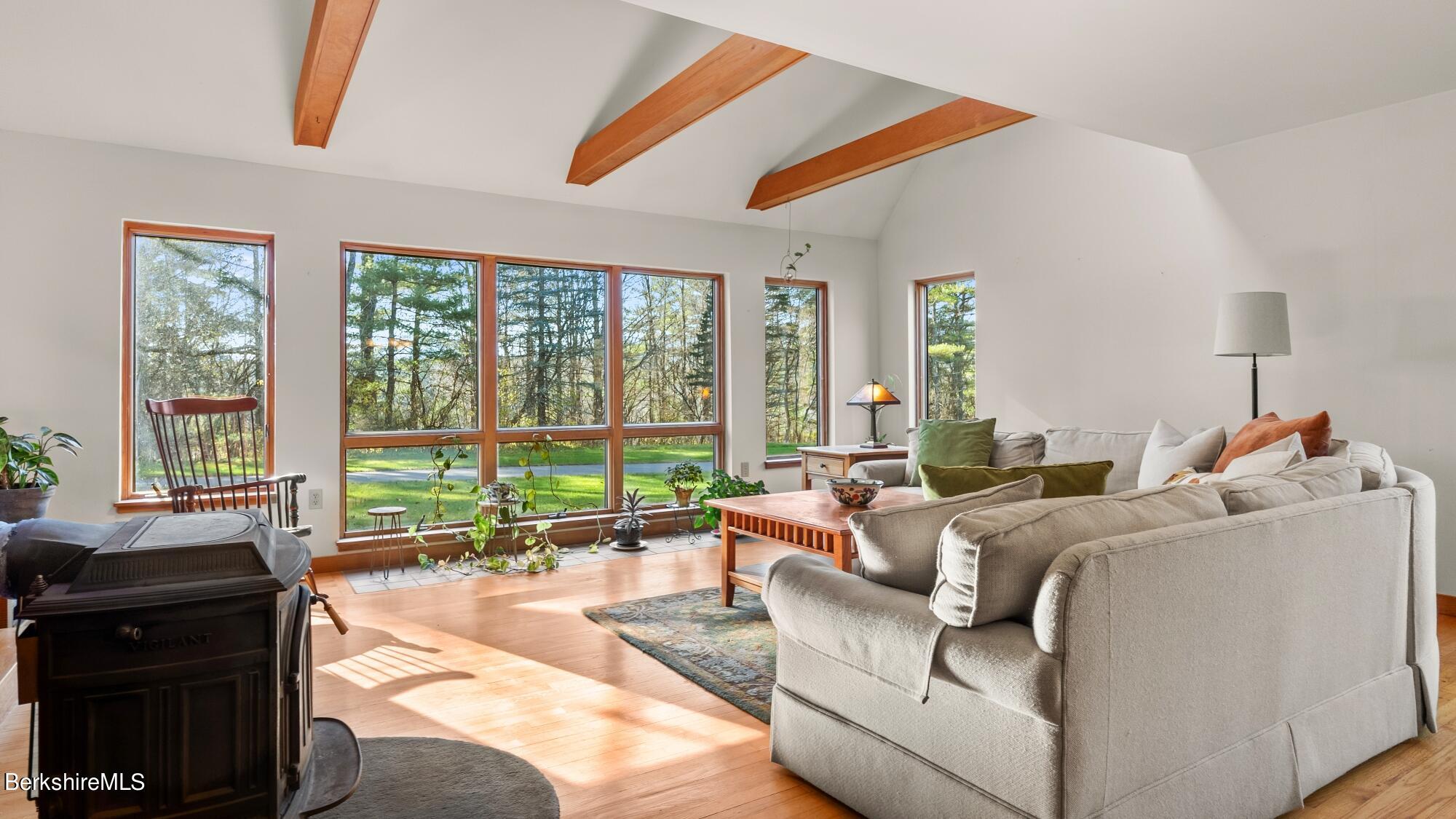 16 Interlaken Road Stockbridge, MA 01266 - Photo 5 of 42 a living room with furniture and large windows