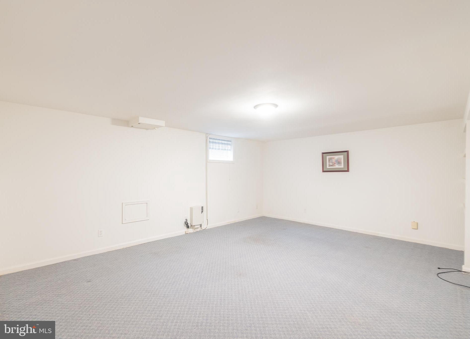503 Denham Road Rockville, MD 20851 - Photo 23 of 30 Lower Level Family Room