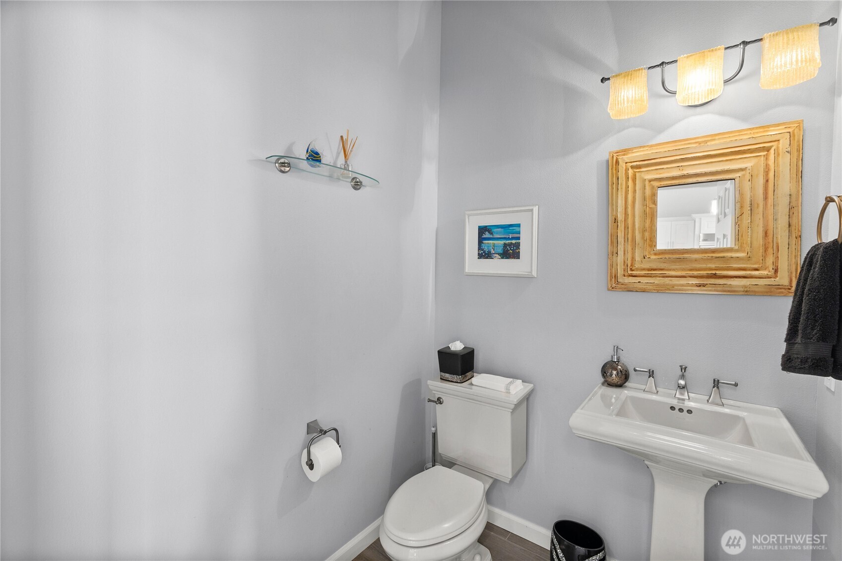 4346 Southwest 307th Street Federal Way, WA 98023 - Photo 15 of 40 a bathroom with a sink mirror and toilet