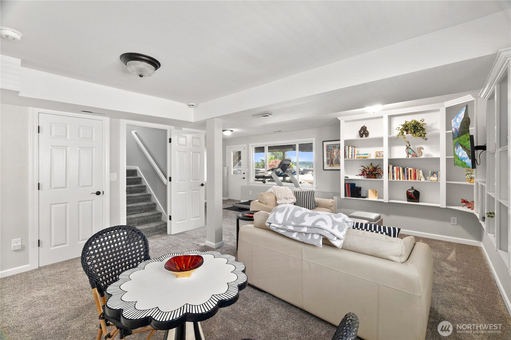 4346 Southwest 307th Street Federal Way, WA 98023 - Photo 20 of 40 a living room with furniture and a floor to ceiling window