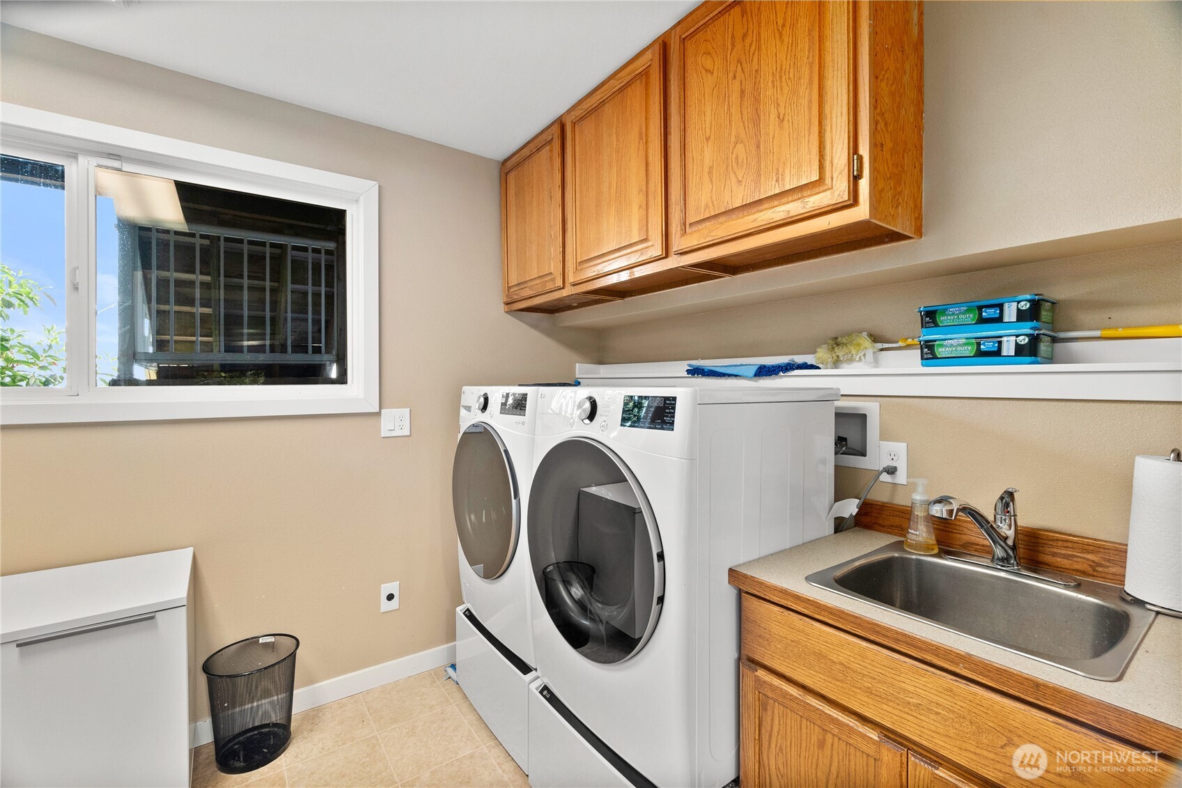4346 Southwest 307th Street Federal Way, WA 98023 - Photo 23 of 40 a utility room with sink dryer and washer