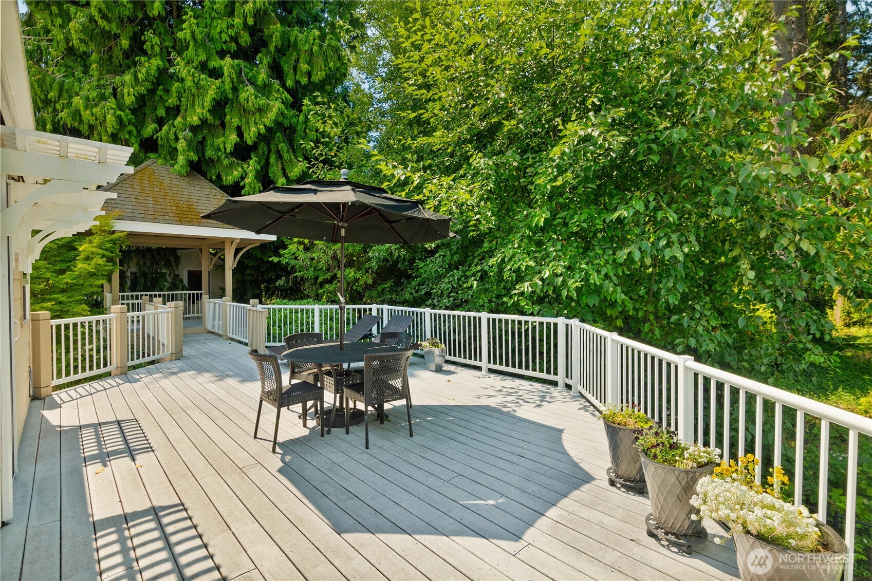 4346 Southwest 307th Street Federal Way, WA 98023 - Photo 33 of 40 a view of a chairs and table on the wooden deck