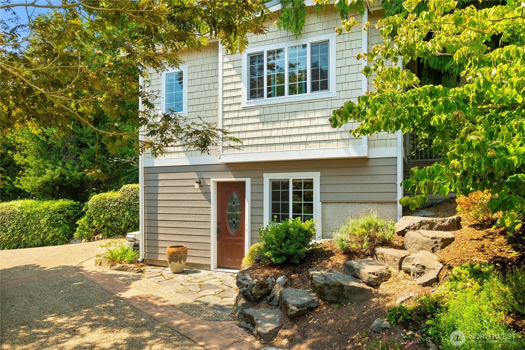 4346 Southwest 307th Street Federal Way, WA 98023 - Photo 34 of 40 a view of a house with potted plants and a tree