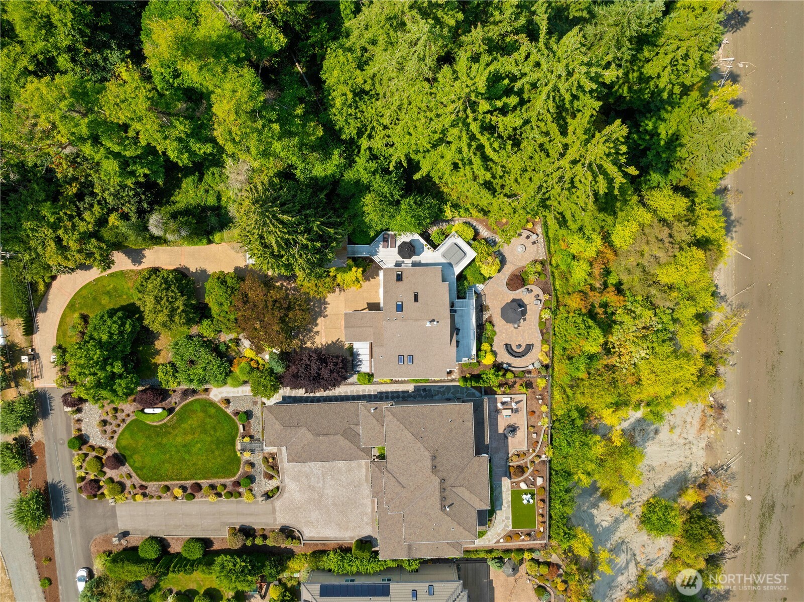 4346 Southwest 307th Street Federal Way, WA 98023 - Photo 4 of 40 an aerial view of a house with a yard and large trees