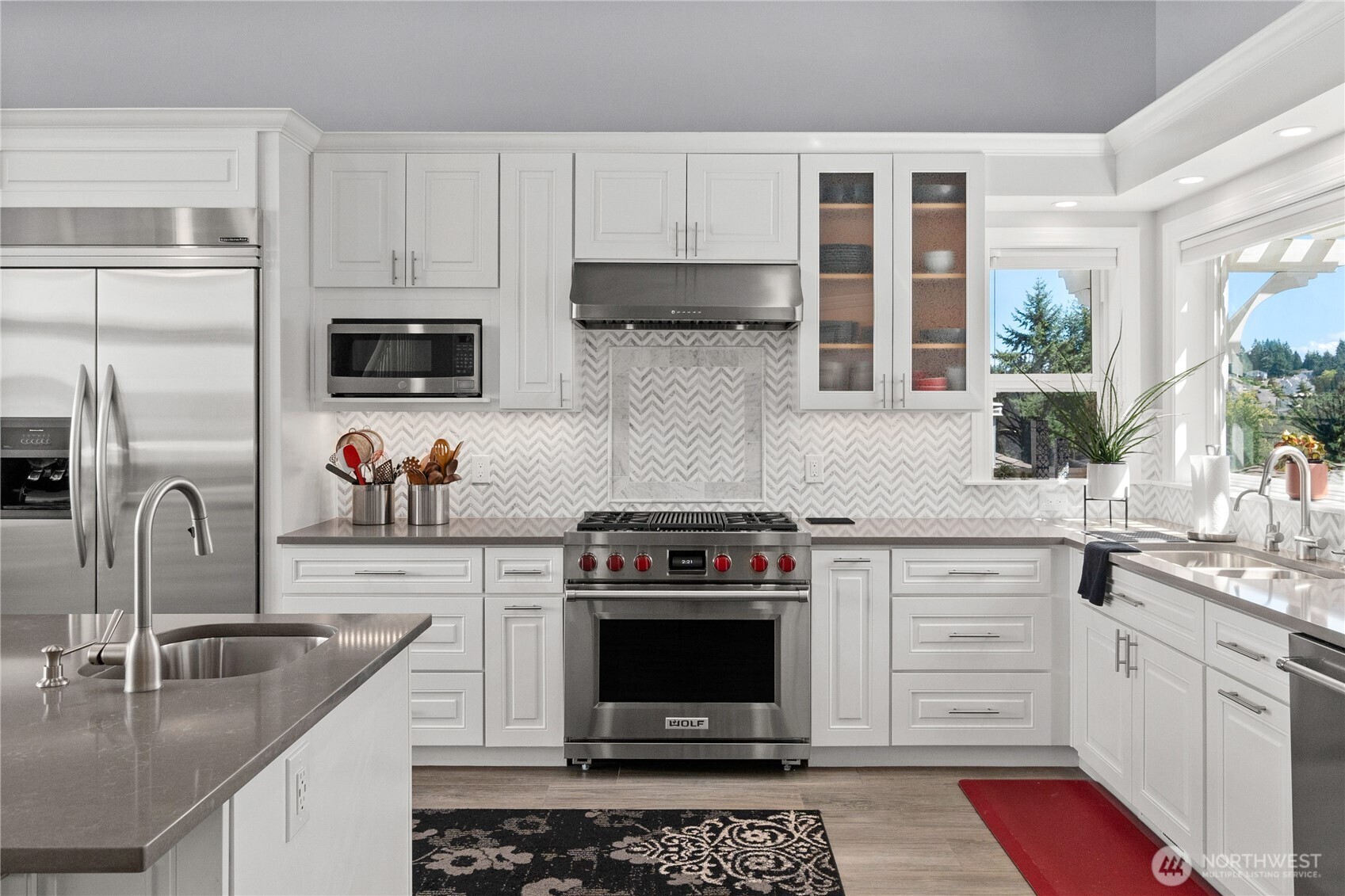 4346 Southwest 307th Street Federal Way, WA 98023 - Photo 9 of 40 a kitchen with cabinets stainless steel appliances and a sink