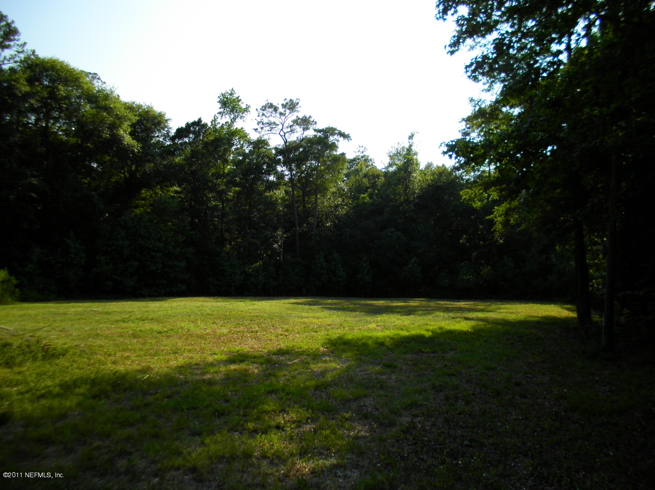 4451 B Barber Road Macclenny, FL 32063 - Photo 5 of 7 Mature trees surround lovely clearing