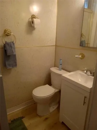 a bathroom with a sink and a toilet