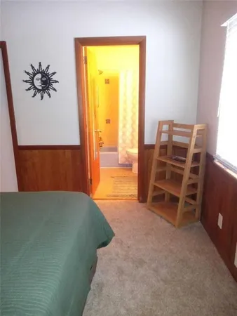 a bathroom with a sink toilet and vanity