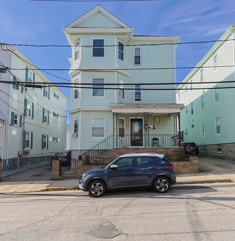 a car parked in front of a building