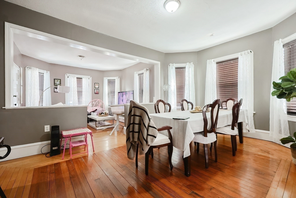105 16th Street Fall River, MA 02723 - Photo 14 of 31 a view of a dining room with furniture and wooden floor