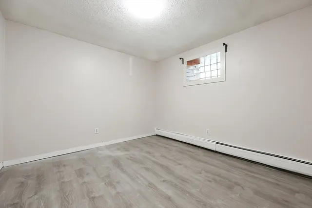 an empty room with a workspace