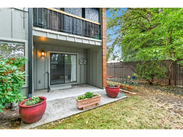 a garden view with a seating space