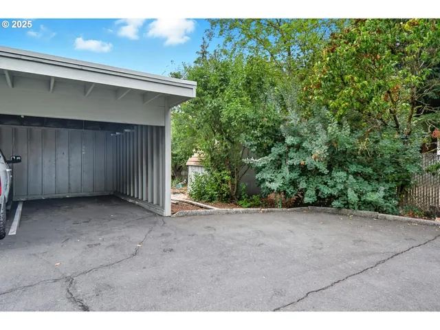an aerial view of houses with outdoor space