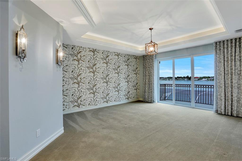 2050 Kingfish Road Naples, FL 34102 - Photo 32 of 35 a view of a kitchen with a sink and cabinet area