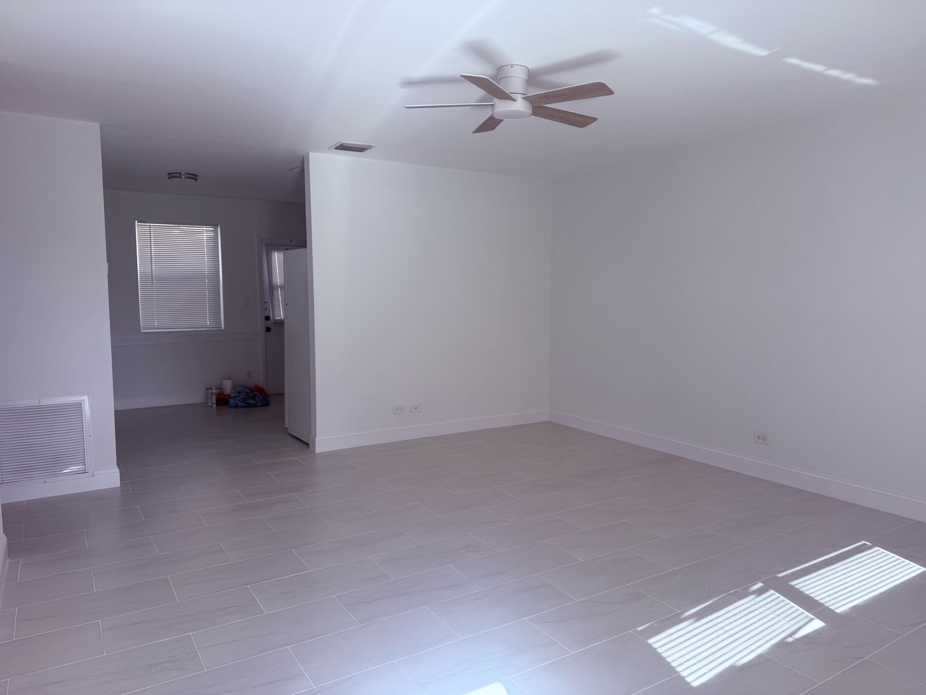 630 Prosperity Farms Road, Unit 1 North Palm Beach, FL 33408 - Photo 3 of 16 a view of empty room