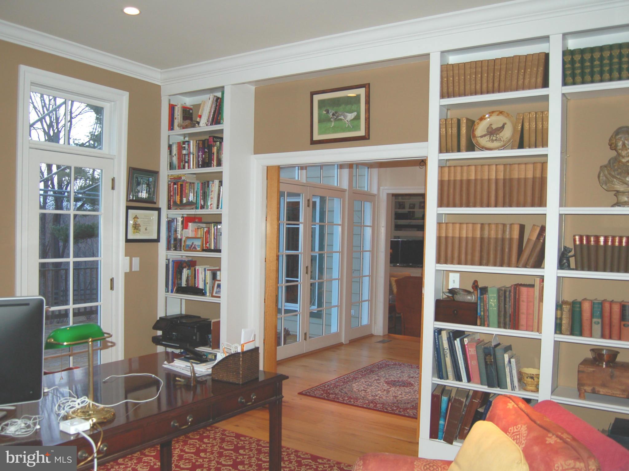 2312 Monkton Road Monkton, MD 21111 - Photo 17 of 30 a living room with furniture and a book shelf