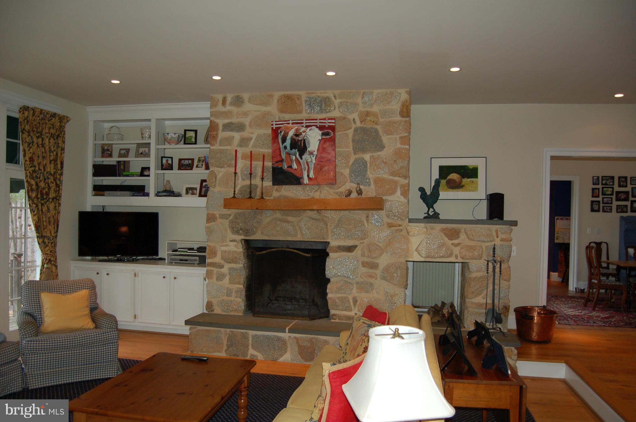 2312 Monkton Road Monkton, MD 21111 - Photo 6 of 30 a living room with furniture and a fireplace
