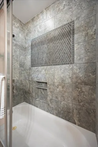 a bathroom with a bathtub