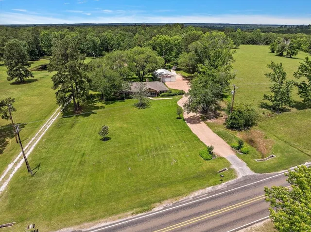 a view of a lake from a yard