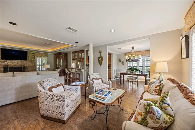 a living room with furniture and a table