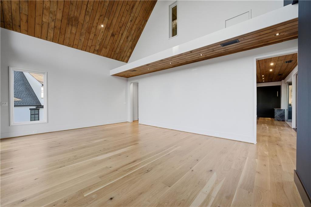 1033 Reeder Circle Northeast Atlanta, GA 30306 - Photo 50 of 77 a view of an empty room with wooden floor