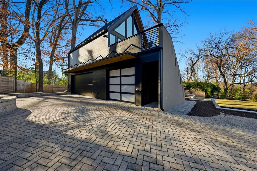 1033 Reeder Circle Northeast Atlanta, GA 30306 - Photo 63 of 77 a house view with a garden space