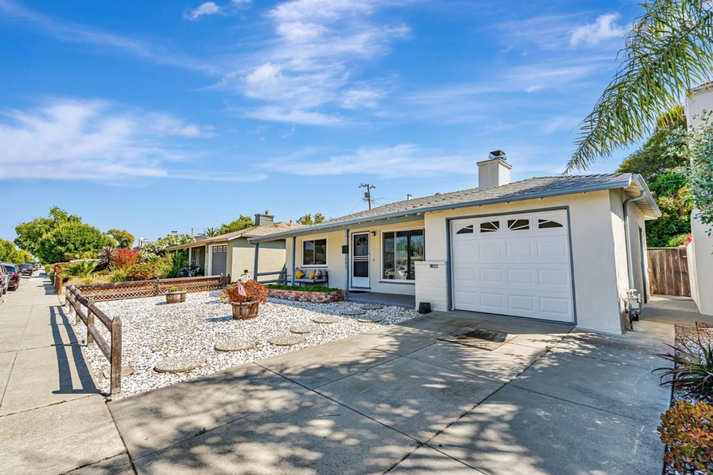 3993 Pasadena Drive San Mateo, CA 94403 - Photo 2 of 40 a view of a house with backyard and sitting area